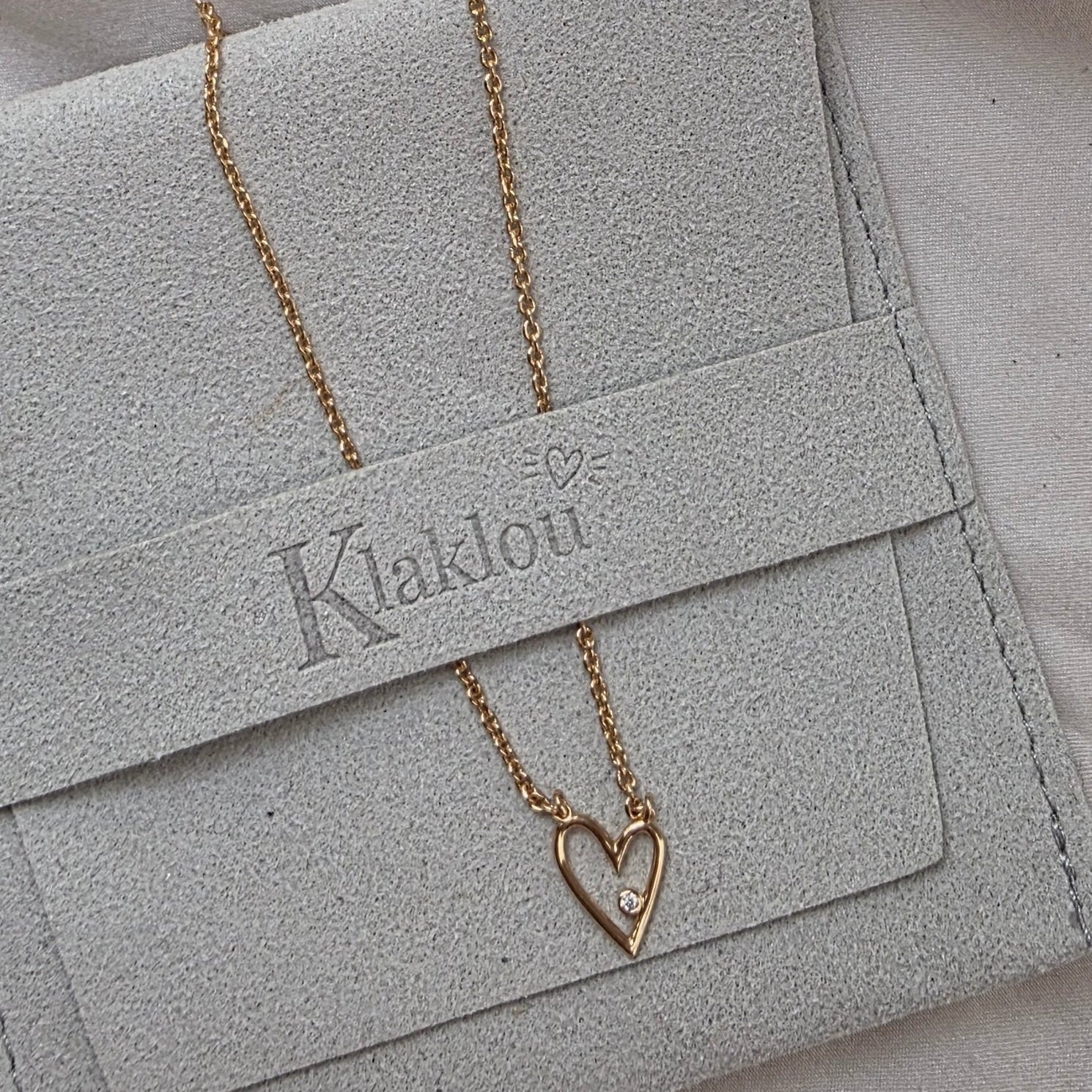 Collier cœur ajouré en plaqué or avec cristal